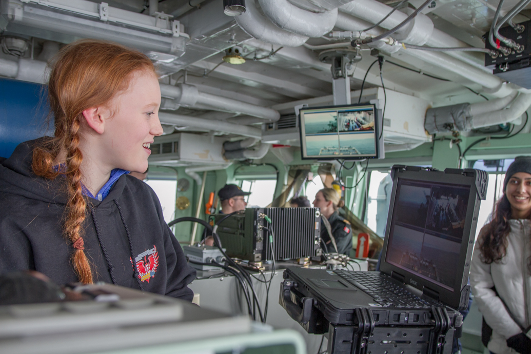 delighted girl in RCN  Commander's chair